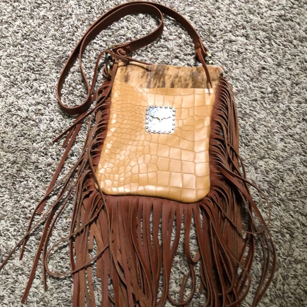 Handmade genuine leather purse.